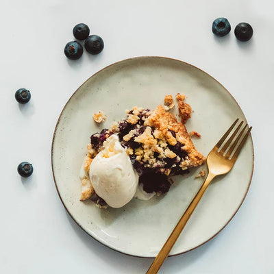 Healthy Bluebery pie with vanilla ice cream.